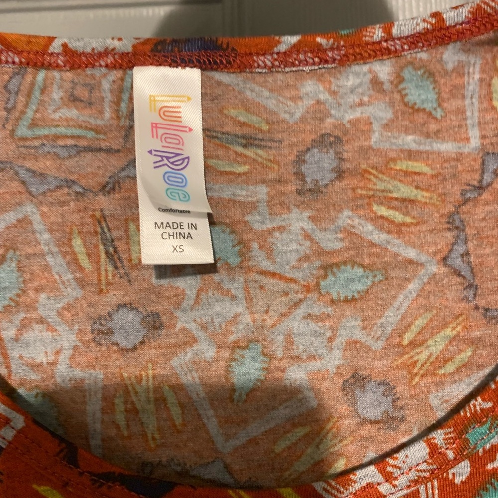 LuLaRoe Geometric Print Top XS - Orange and Teal